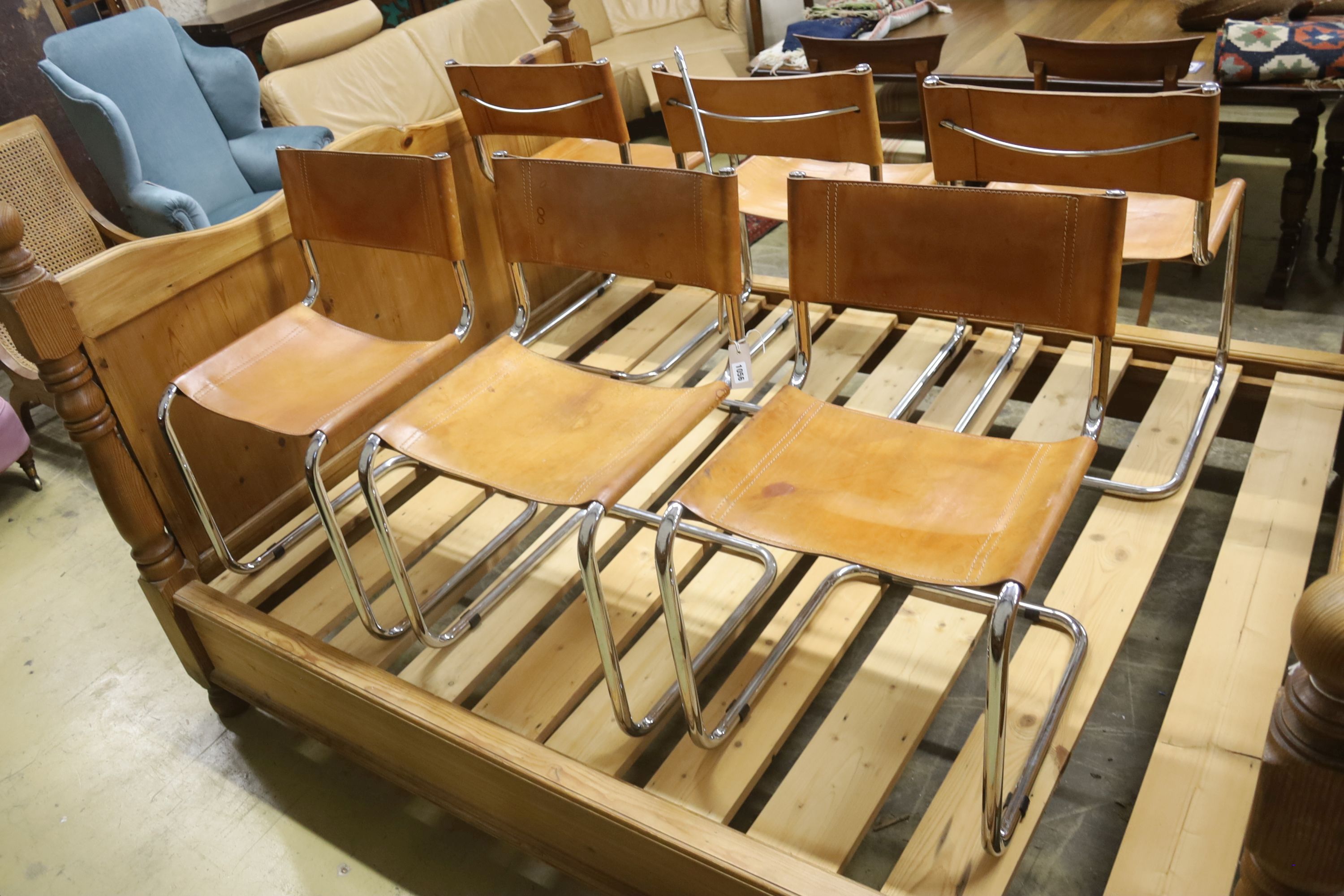 A set of six Italian design tan leather and chrome cantilever dining chairs, width 48cm, depth 44cm, height 77cm